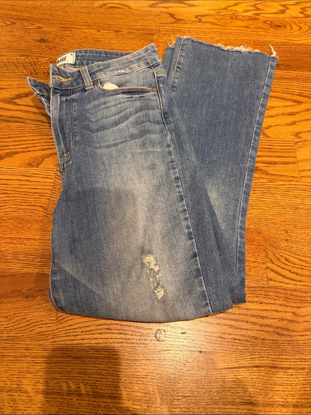 PAIGE Light Blue Crop Flare Jeans with Raw Hem